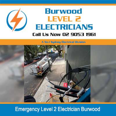 Emergency level 2 electrician performing electrical cable work on street in Burwood